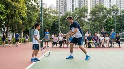 Coach teaching junior footwork at Victoria Park