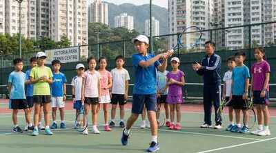 Junior boy practicing forehand at Victoria Park
