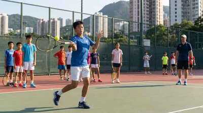 Junior hitting during group lesson at Victoria Park
